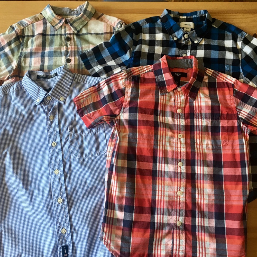 Lot of 4 boys short sleeve button down shirts.